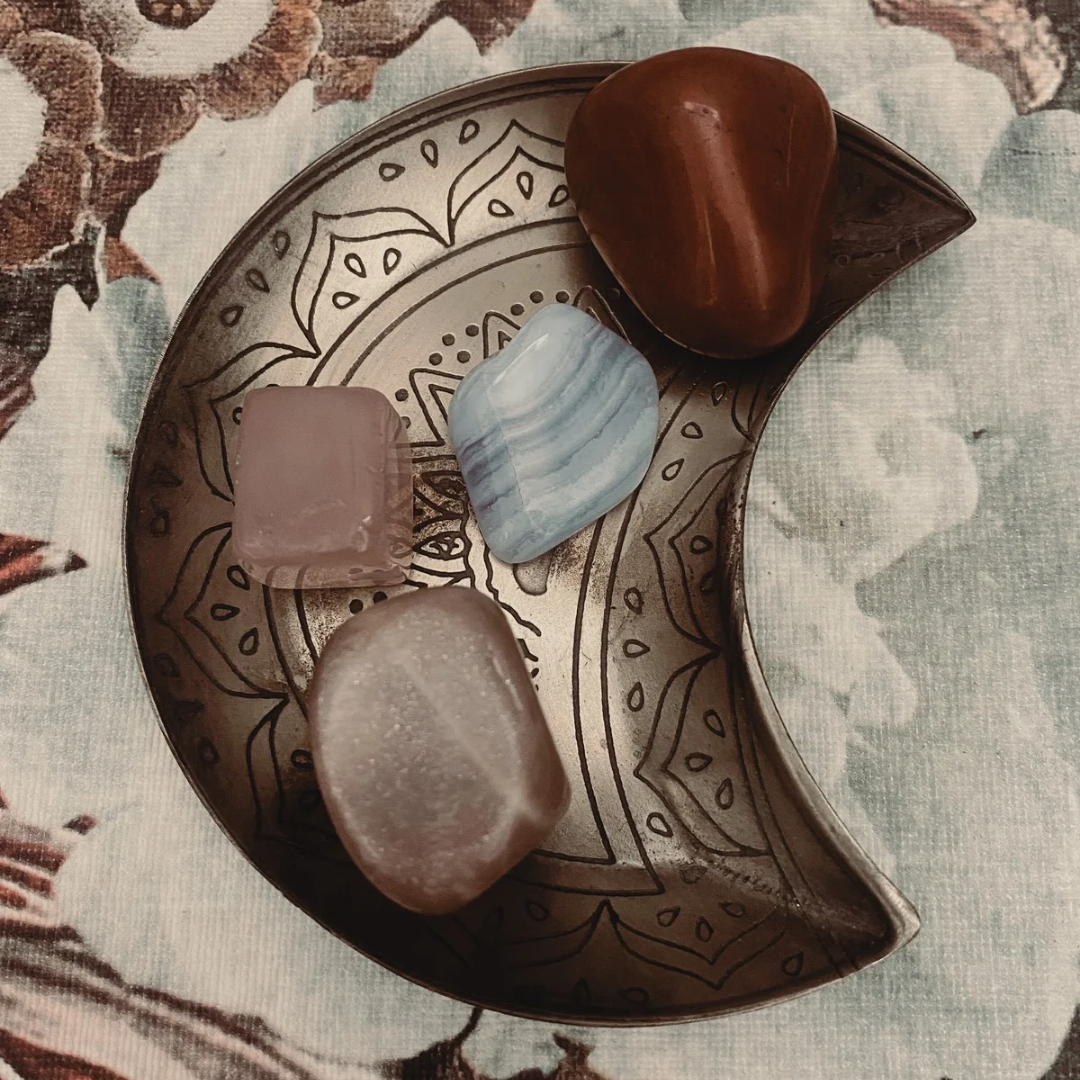 Various tumbled crystals of varying shapes and sizes available at The Little Witch