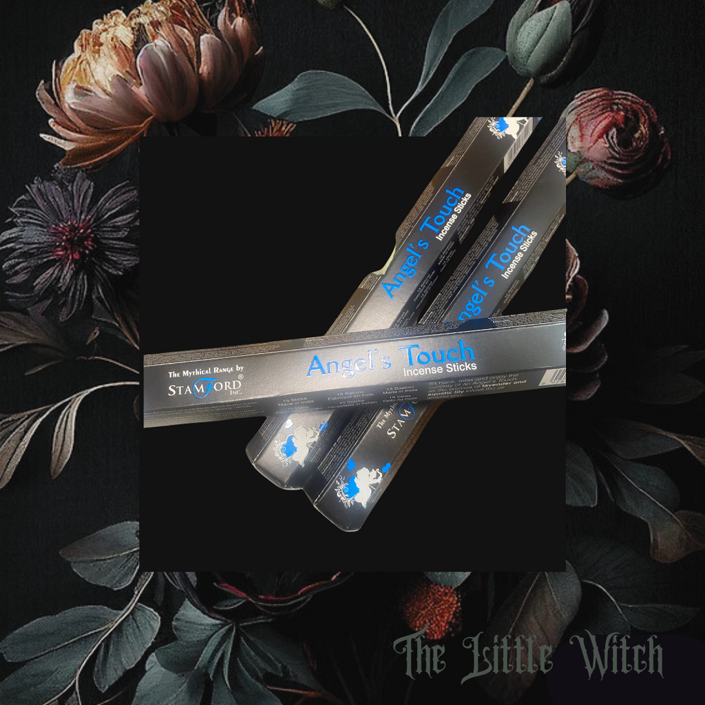 Unopened boxes of 'Angel's Touch' incense sticks with black background and The Little Witch branding