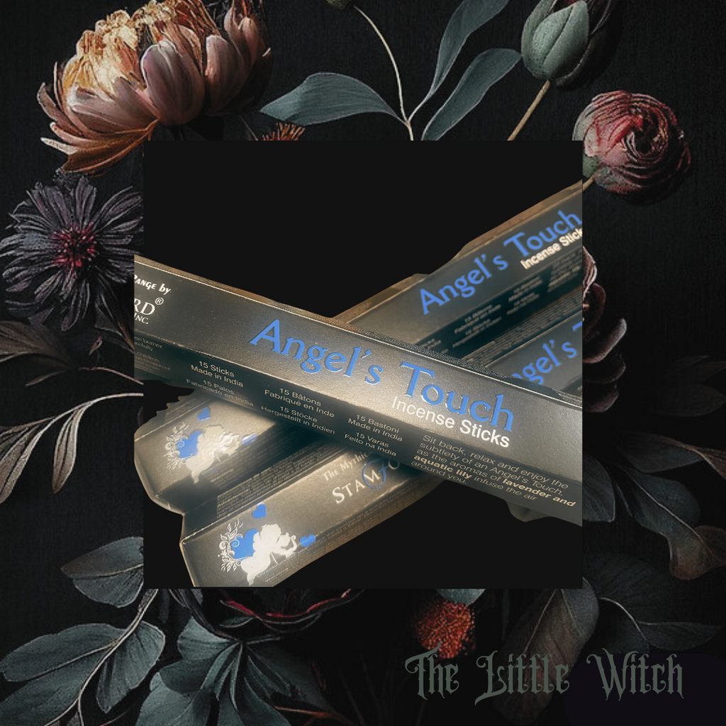 Packaging of Angel’s Touch incense sticks with floral background, predominantly featuring purple and black colors.