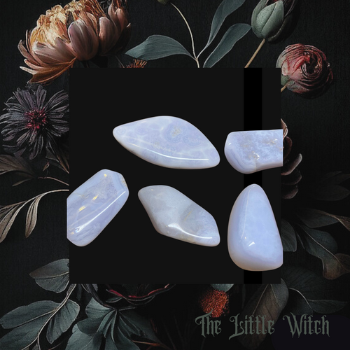A collection of Blue Lace Agate stones displayed on a dark background with floral elements around the edges.