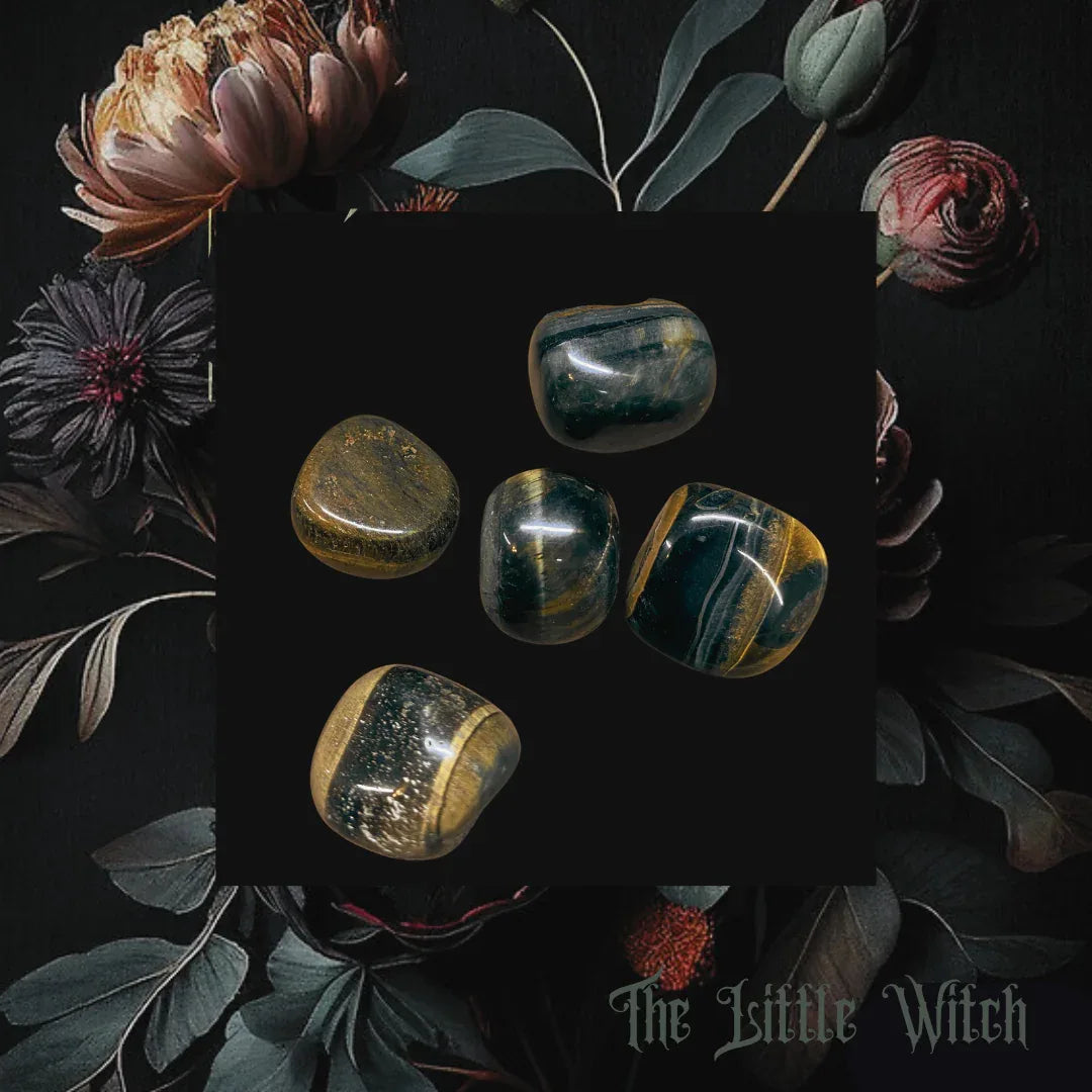 Set of Hawks eye stones on a dark background with flowers and leaves, featuring 'The Little Witch' branding.