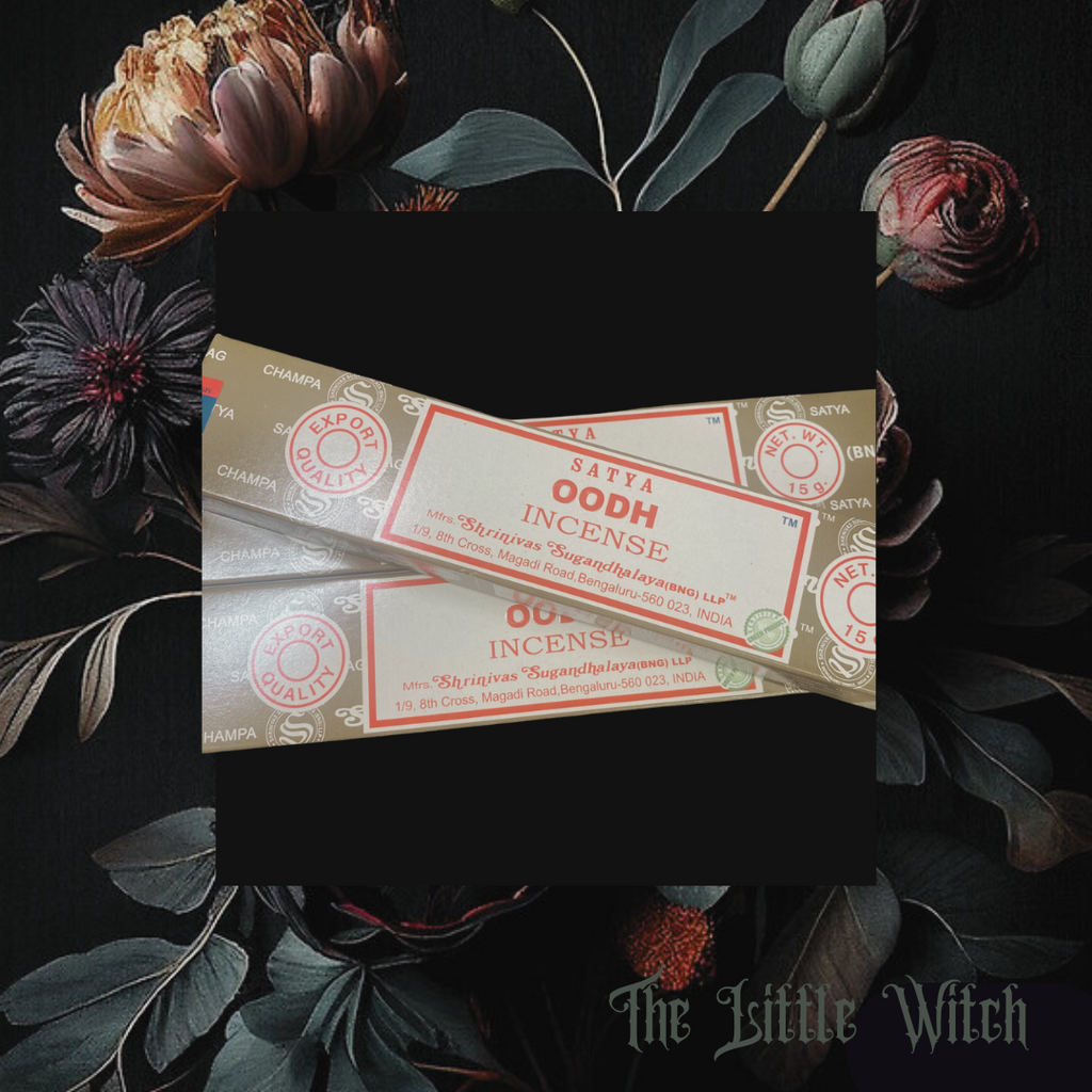 A package of Oodh incense sticks presented on a dark background with floral elements, branding it with 'The Little Witch'.