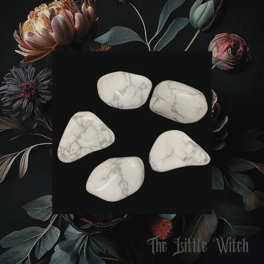 White marbled crystals on a dark background with flowers and leaves, featuring 'The Little Witch' branding.