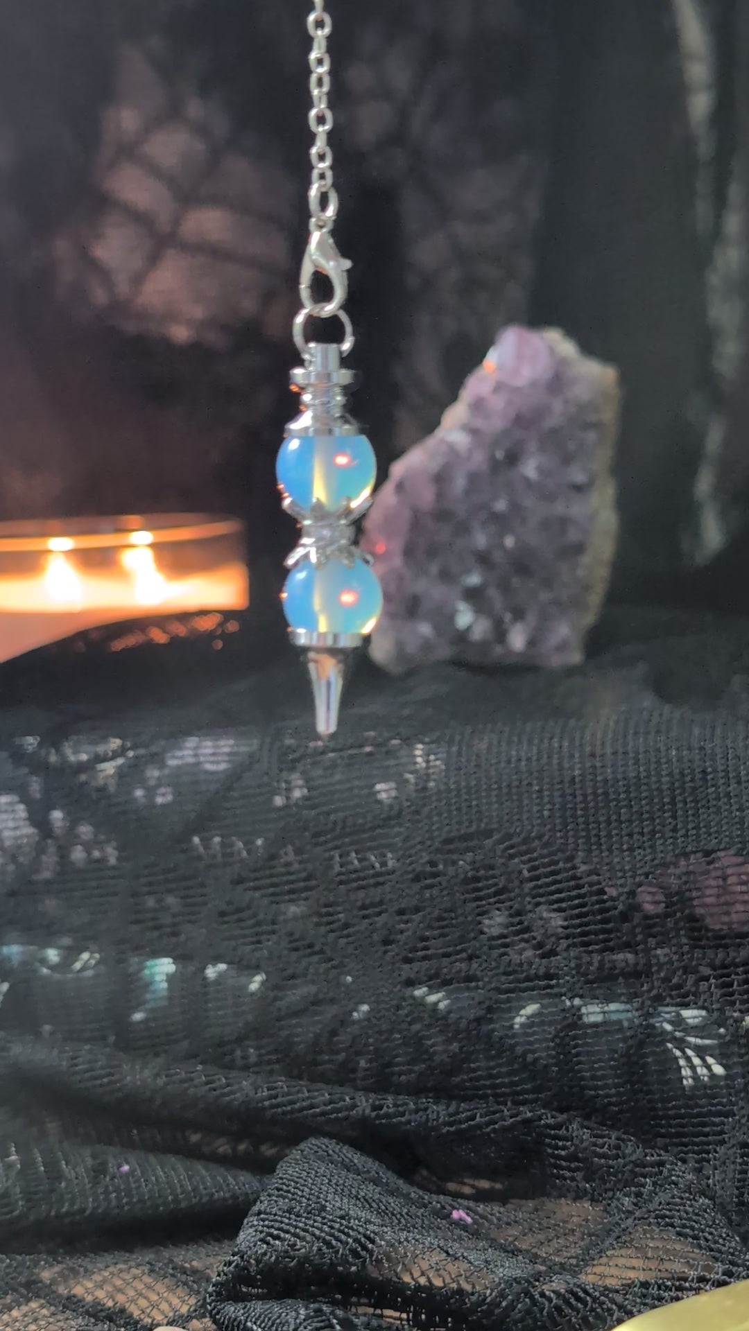 A video of the double Opalite pendulum answering yes or no questions 