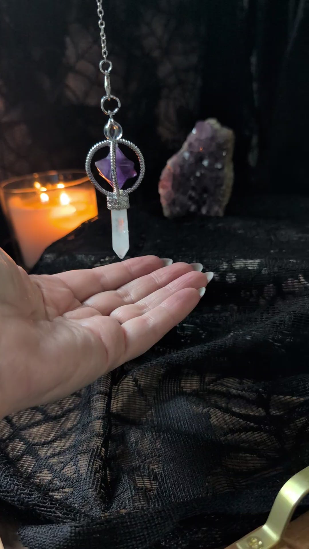 The Amethyst Merkabah and Clear Quartz wand pendulum answering yes or no questions