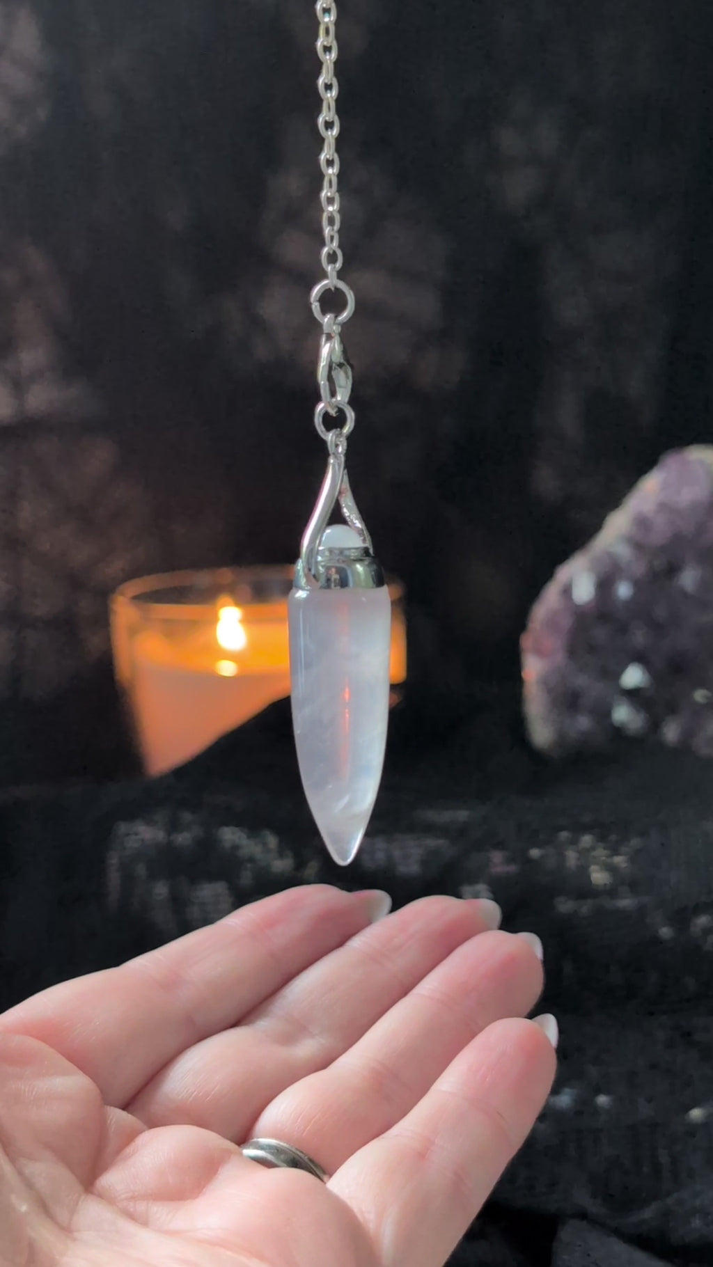 Rose Quartz cone pendulum video showing the swinging movements of yes or no answers