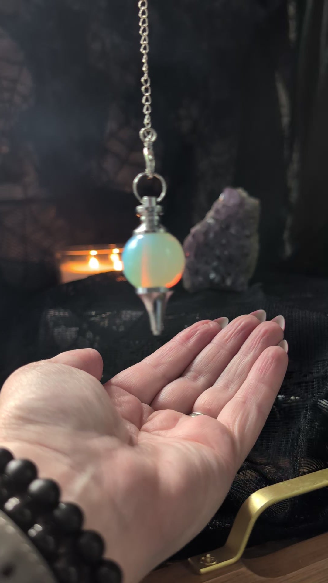 Opalite ball pendulum answering yes or no questions