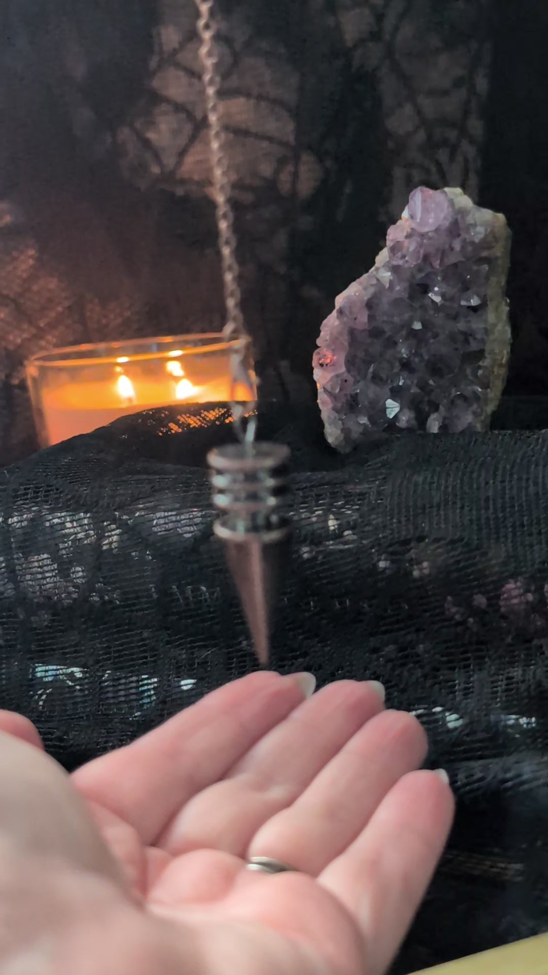 Bronze metal cone pendulum answering yes or no questions