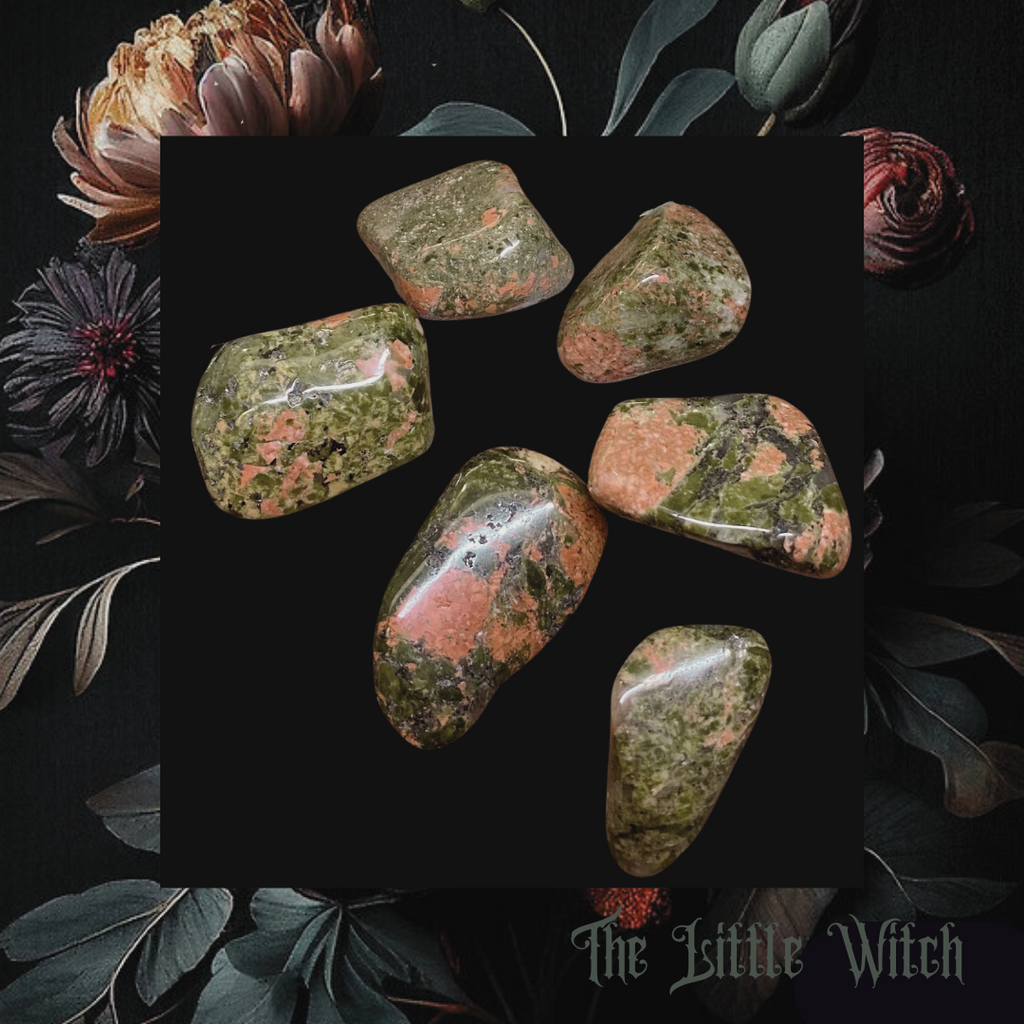 A collection of polished unakite crystals displayed on a dark background, with green and pink mottled patterns.